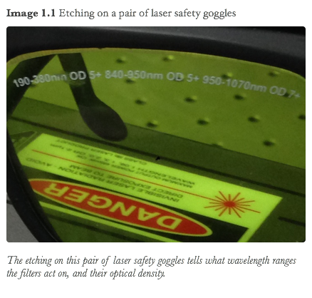Image 1.1 Etching on a pair of laser safety goggles
The etching on this pair of laser safety goggles tells what wavelength ranges the filters act on, and their optical density.